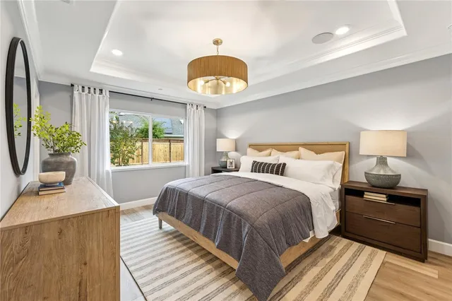 a bedroom with bed and a window