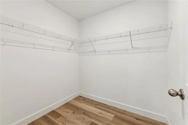 a view of a room with racks on the wall