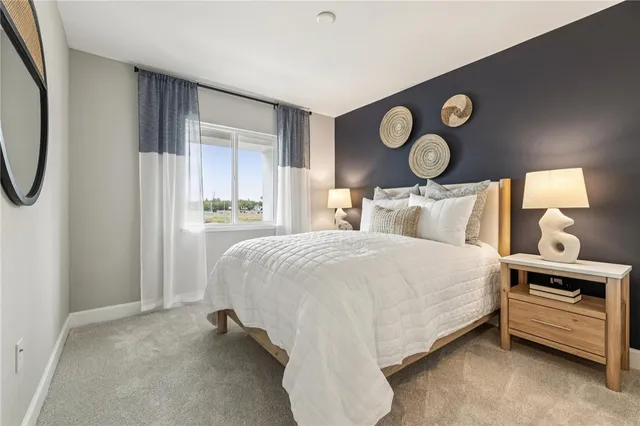 a bedroom with a bed and closet