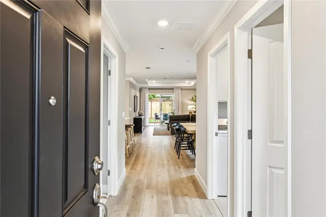 a view of a living room and a wooden floor