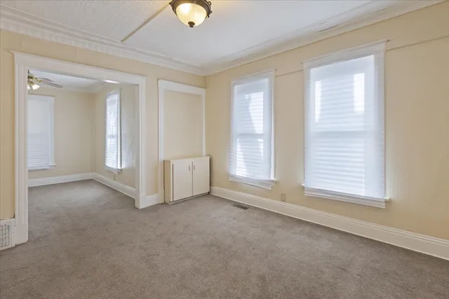 an empty room with windows