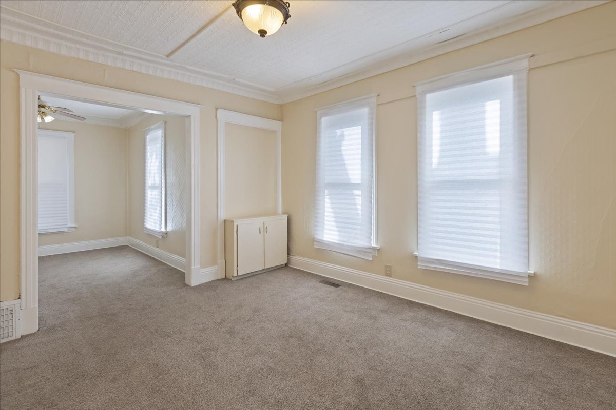 710 South Martin Luther King Junior Avenue Waukegan, IL 60085 - Photo 11 of 35 an empty room with windows