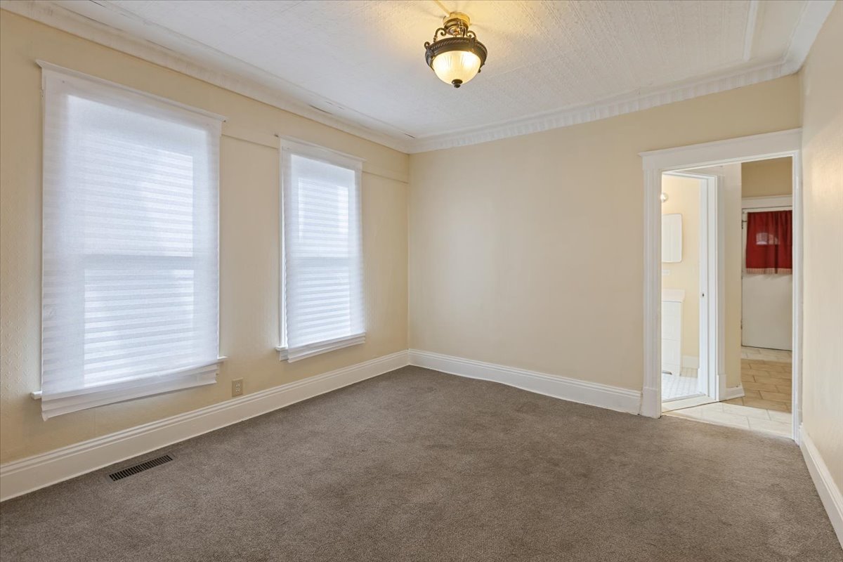 710 South Martin Luther King Junior Avenue Waukegan, IL 60085 - Photo 12 of 35 a view of an empty room with a window