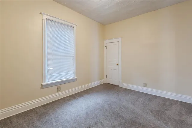 an empty room with a door