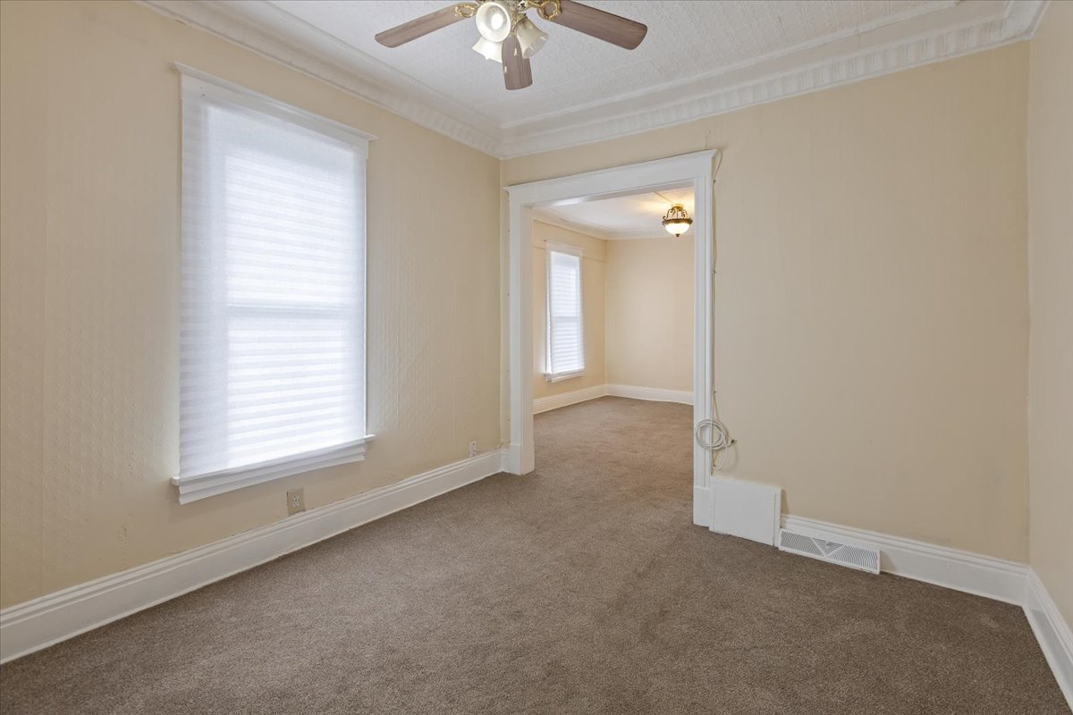 710 South Martin Luther King Junior Avenue Waukegan, IL 60085 - Photo 9 of 35 an empty room with a empty space and a window