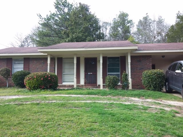 5945 Mill Branch Road Columbus, GA 31907 - Photo 1 of 7 a view of a house with yard and tree s