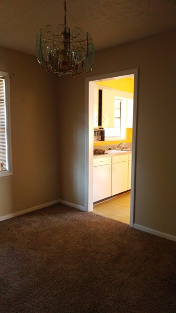 5945 Mill Branch Road Columbus, GA 31907 - Photo 6 of 7 a view of an empty room and window