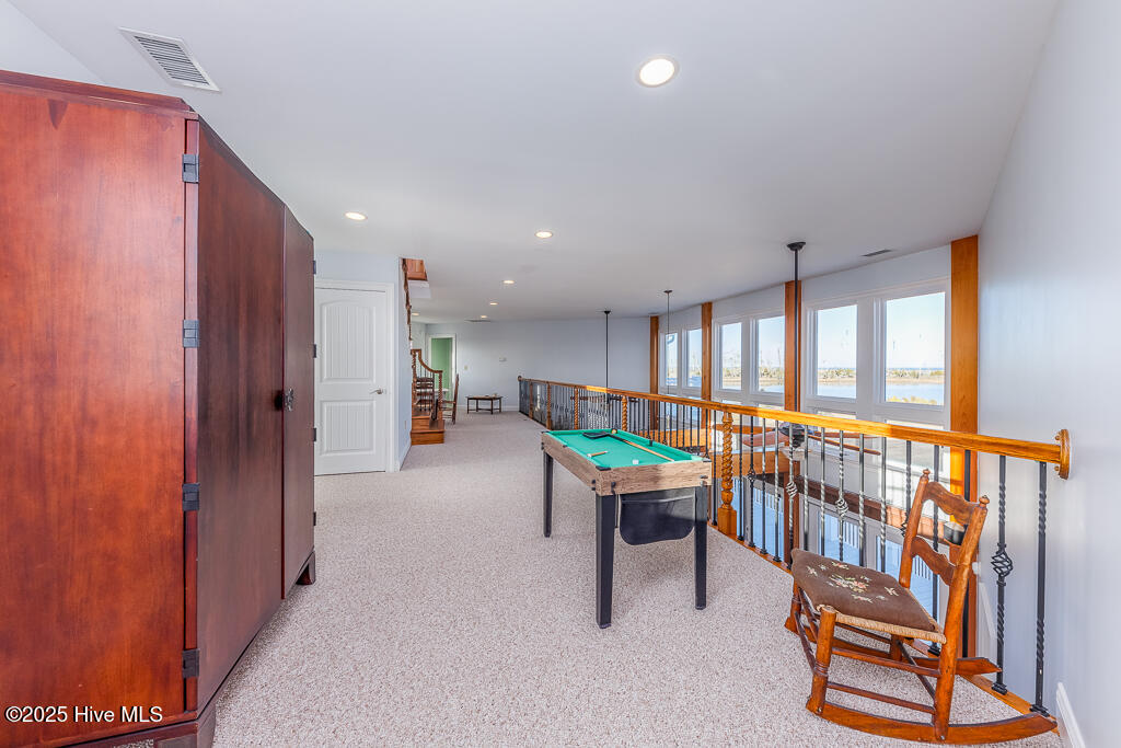 180 Taylor Road Marshallberg, NC 28553 - Photo 12 of 35 Second Level Balcony with Huge Windows