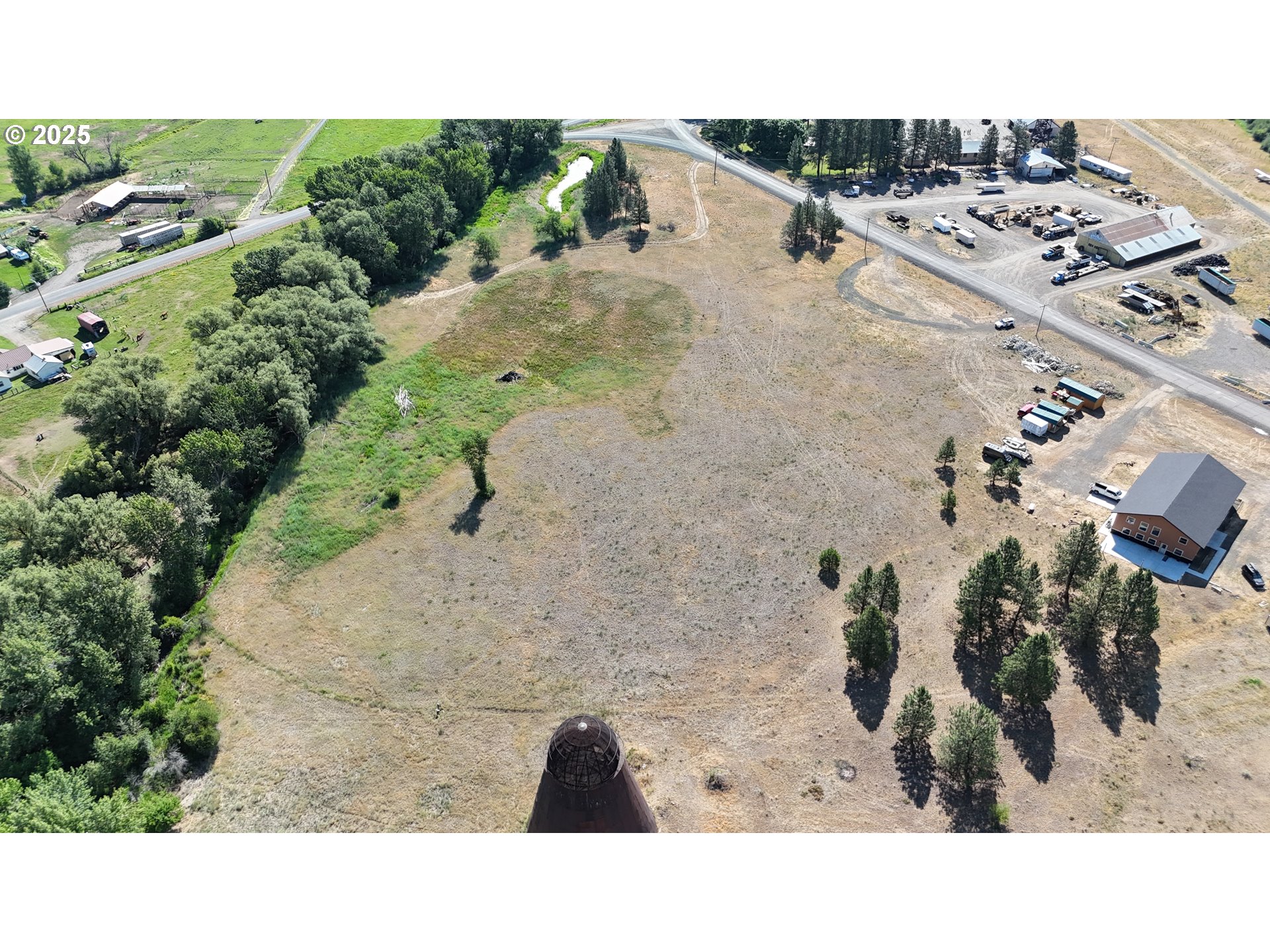 Sawmill Cutoff Lane Halfway, OR 97834 - Photo 2 of 9 a black and white photo of a building