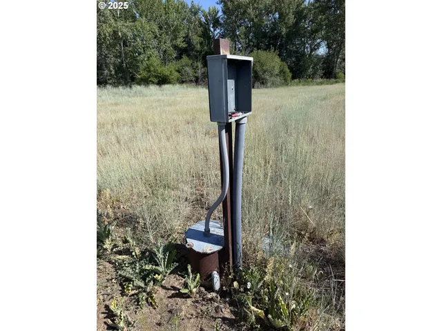 a view of lake with mountain in background
