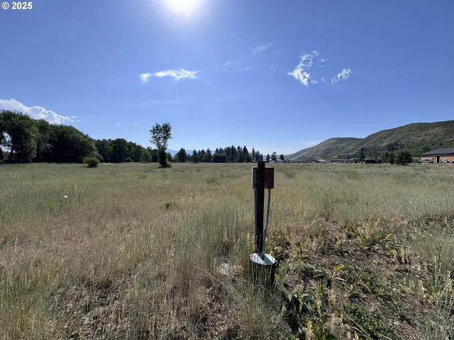 a view of a city with a lake