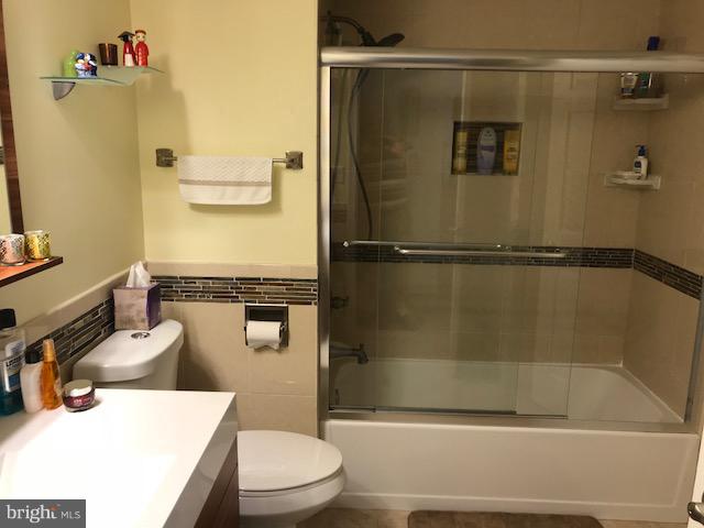 1644 Barnstead Drive Reston, VA 20194 - Photo 15 of 23 a bathroom with a sink a toilet and shower
