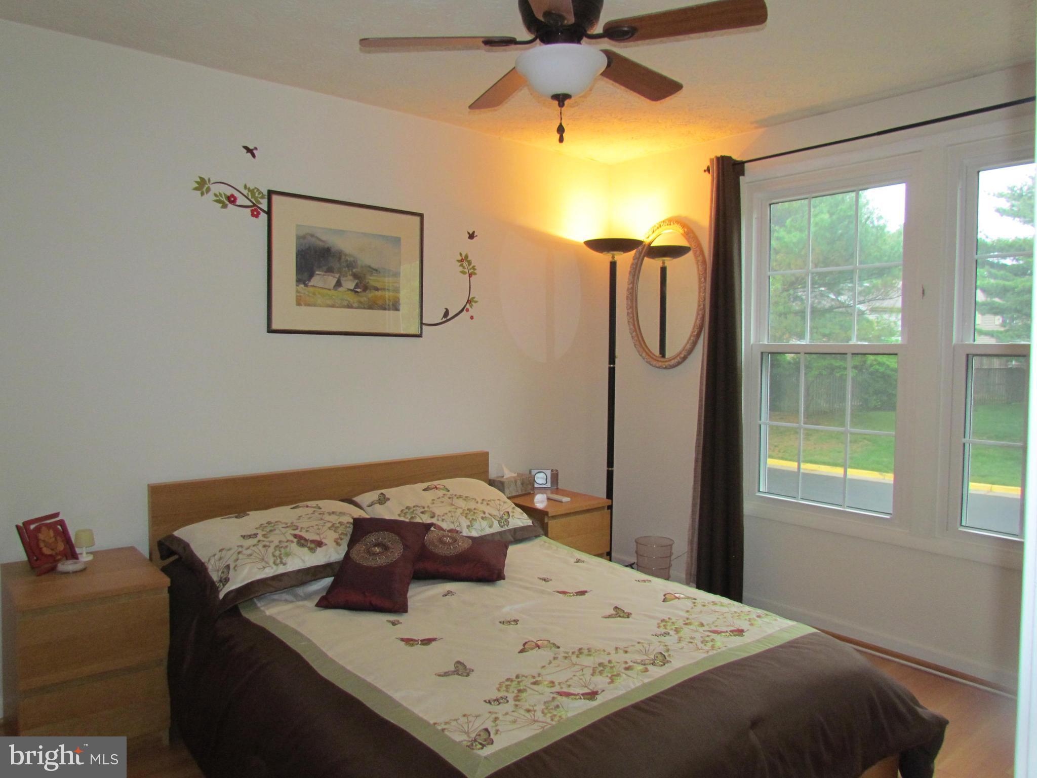 1644 Barnstead Drive Reston, VA 20194 - Photo 17 of 23 a bedroom with a bed and window