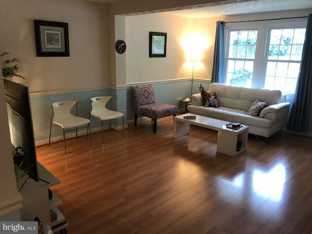 1644 Barnstead Drive Reston, VA 20194 - Photo 3 of 23 a living room with furniture and a large window