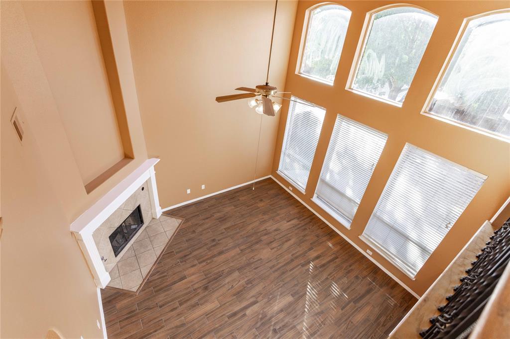 9201 Hunter Chase Drive McKinney, TX 75072 - Photo 31 of 35 a view of an empty room and wooden floor