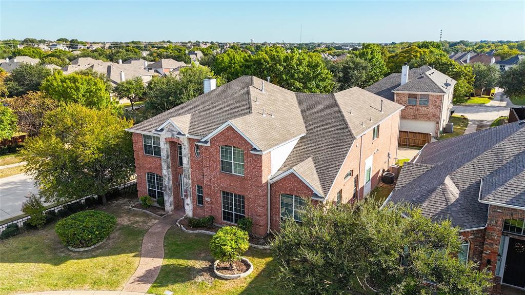 9201 Hunter Chase Drive McKinney, TX 75072 - Photo 33 of 35 an aerial view of a house with a yard
