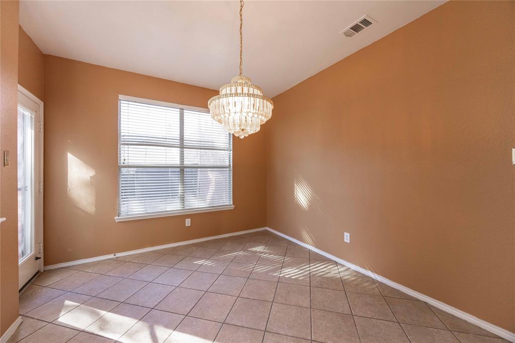 9201 Hunter Chase Drive McKinney, TX 75072 - Photo 6 of 35 a view of an empty room with a window