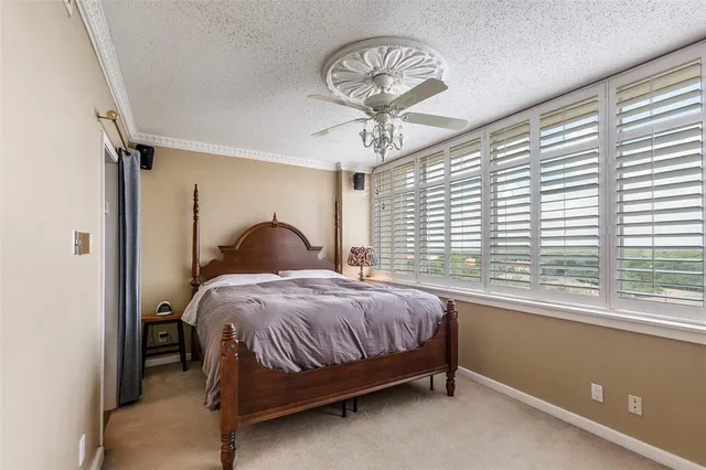 a kitchen with cabinets appliances and a sink