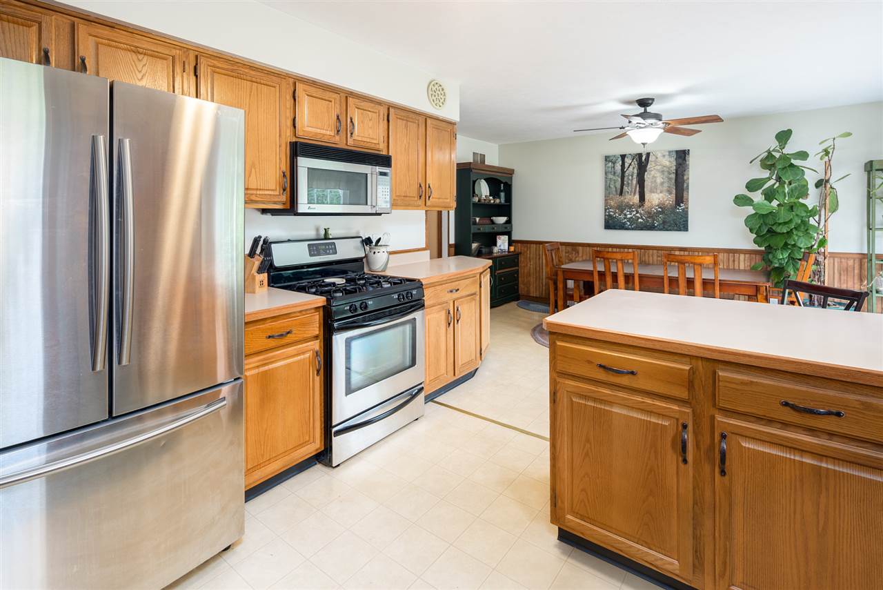 10111 Beaver Valley Road Belvidere, IL 61008 - Photo 10 of 25 a kitchen with stainless steel appliances a refrigerator stove and sink
