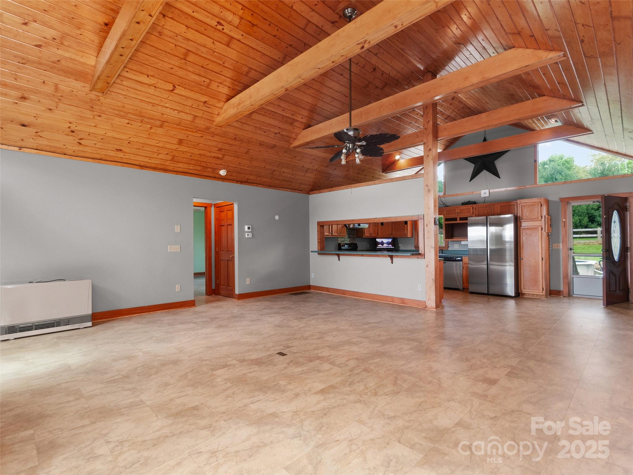 672 Windswept Ridge Road Leicester, NC 28748 - Photo 3 of 30 a view of an empty room with kitchen