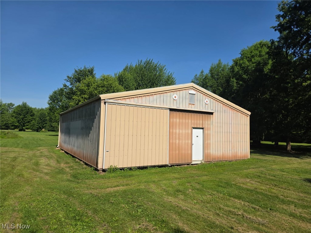 13962 Quarry Road Oberlin, OH 44074 - Photo 41 of 43 View of outbuilding featuring a yard