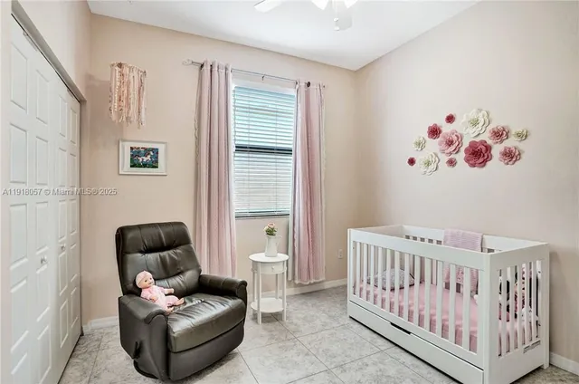 a bedroom with furniture and a couch