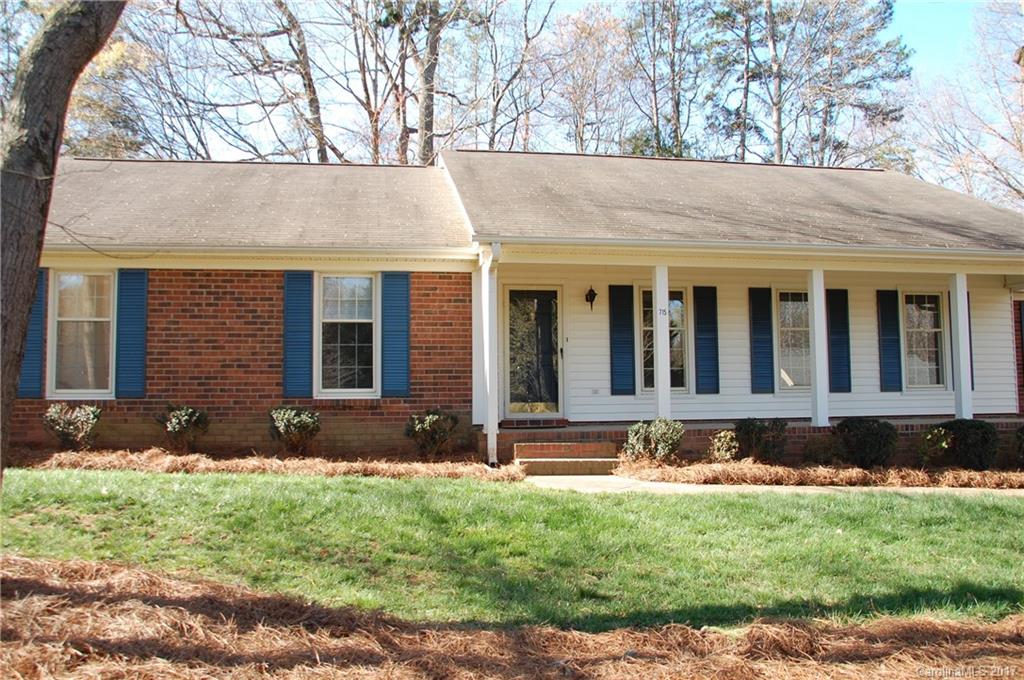 715 Trail Ridge Road Matthews, NC 28105 - Photo 1 of 13 a view of a house with backyard and sitting area