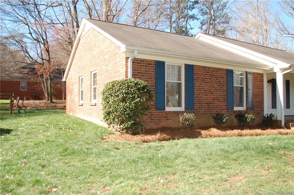 715 Trail Ridge Road Matthews, NC 28105 - Photo 11 of 13 a view of a house with yard and sitting area