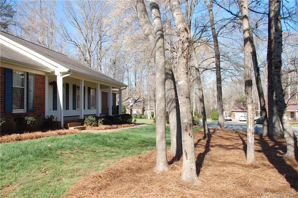 715 Trail Ridge Road Matthews, NC 28105 - Photo 13 of 13 a view of a house with backyard and a tree