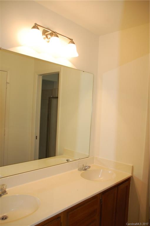715 Trail Ridge Road Matthews, NC 28105 - Photo 5 of 13 a bathroom with a sink and a mirror