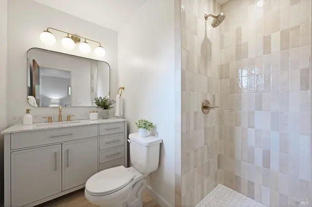 a bedroom with a bed and a lamp