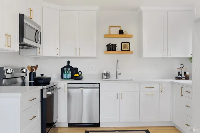 a dining room with furniture and a window