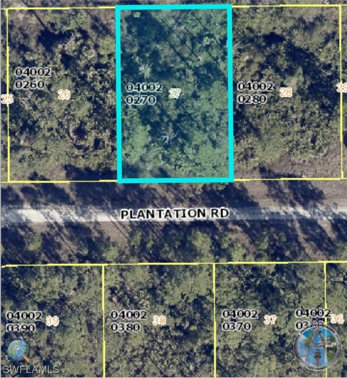 1131 Plantation Road Lehigh Acres, FL 33974 - Photo 1 of 3 a view of a yard