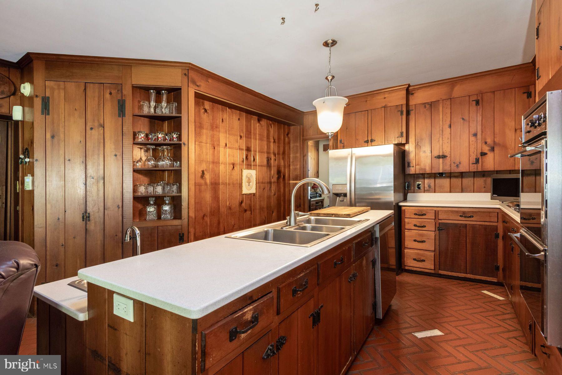 2349 Valley Road Jamison, PA 18929 - Photo 27 of 53 a kitchen with a stove a sink and a refrigerator