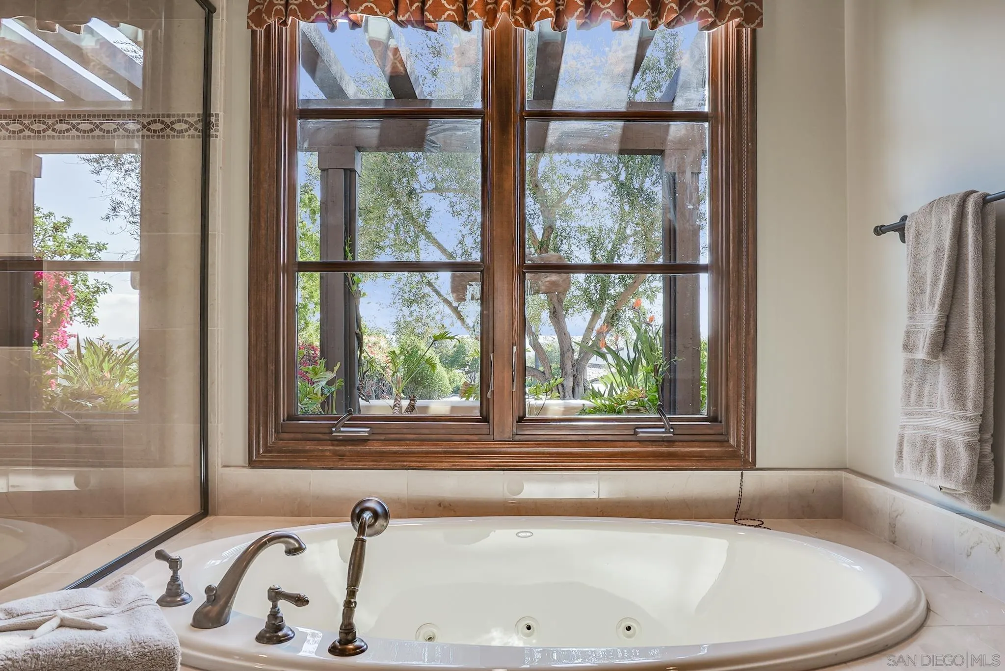16581 Rd To Rio San Diego, CA 92127 - Photo 14 of 48 a bathroom with shower and window