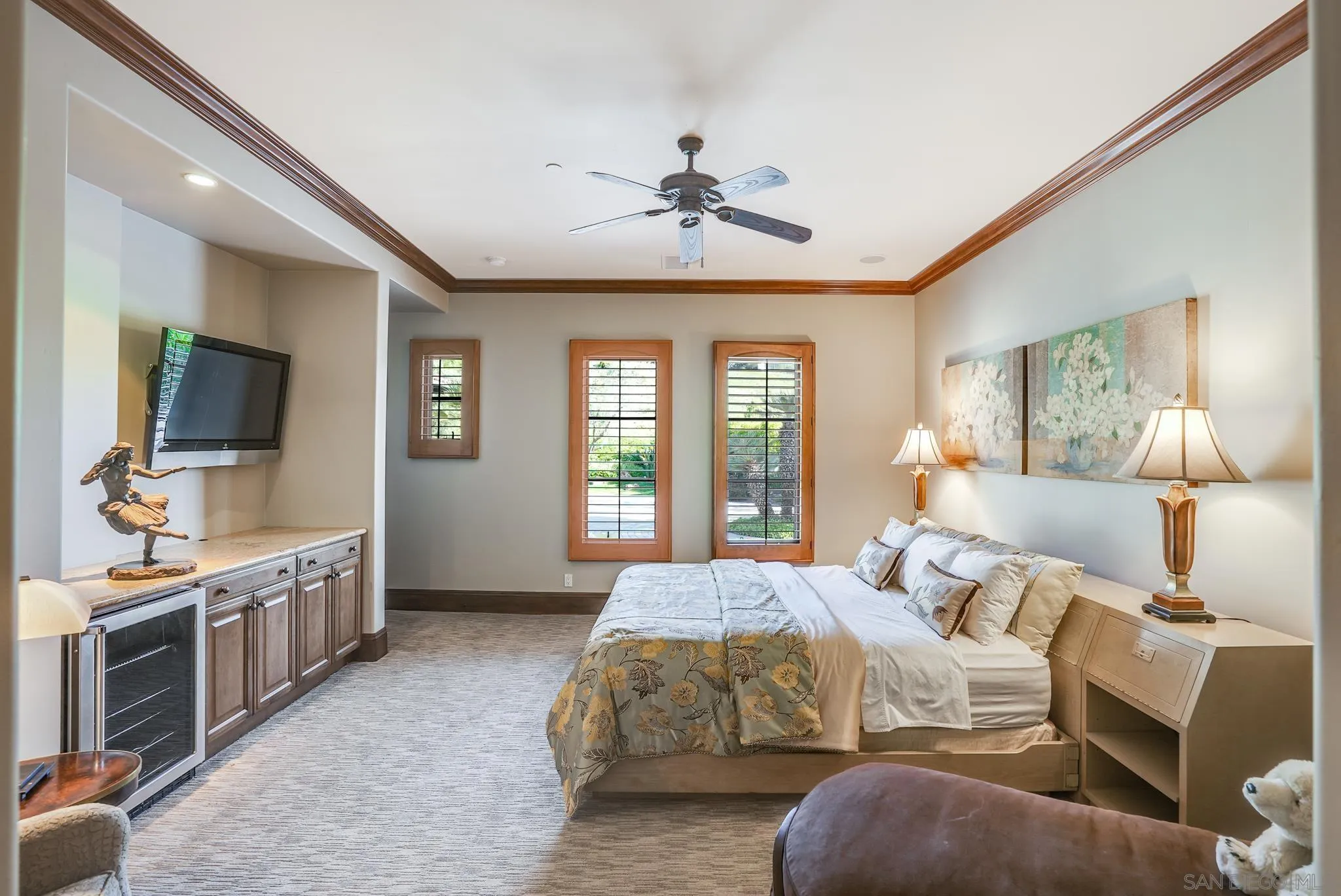 16581 Rd To Rio San Diego, CA 92127 - Photo 15 of 48 a spacious bedroom with a large bed and a flat tv screen on dresser