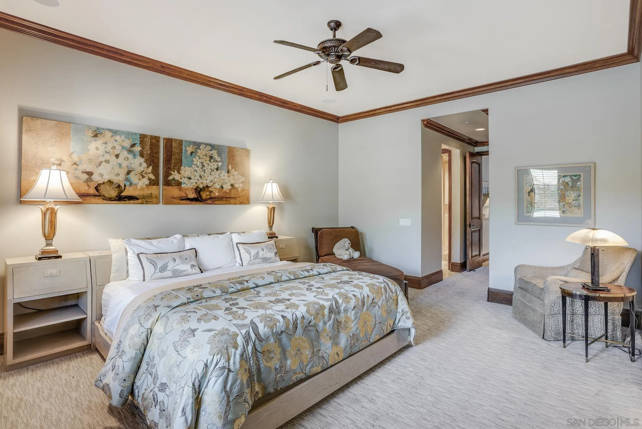 16581 Rd To Rio San Diego, CA 92127 - Photo 16 of 48 a bedroom with a bed and painting on the wall