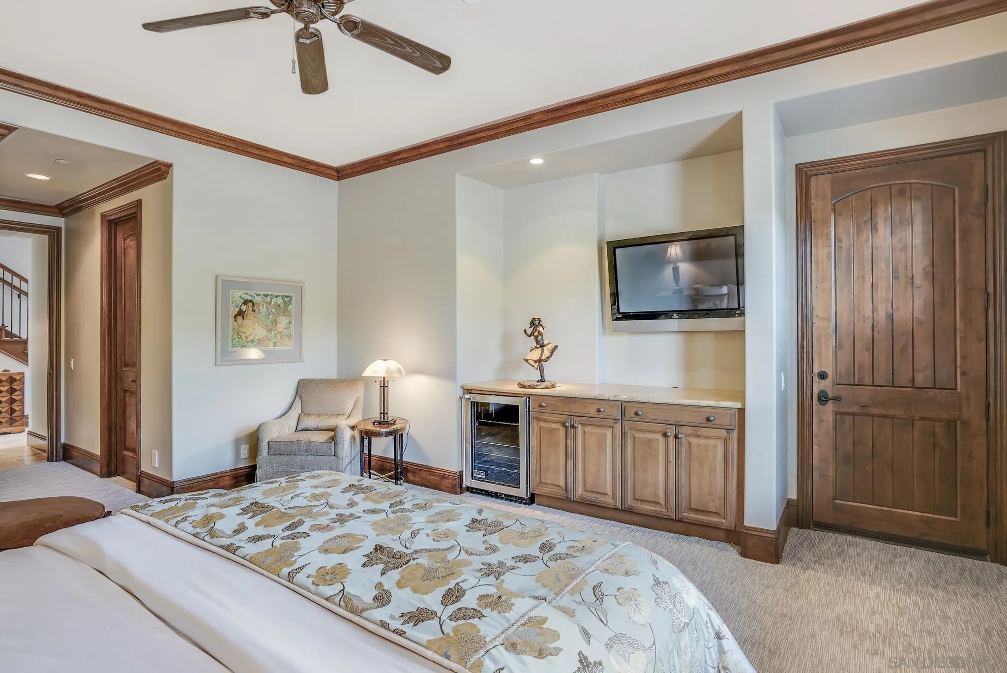 16581 Rd To Rio San Diego, CA 92127 - Photo 17 of 48 a spacious bedroom with a bed and a flat screen television