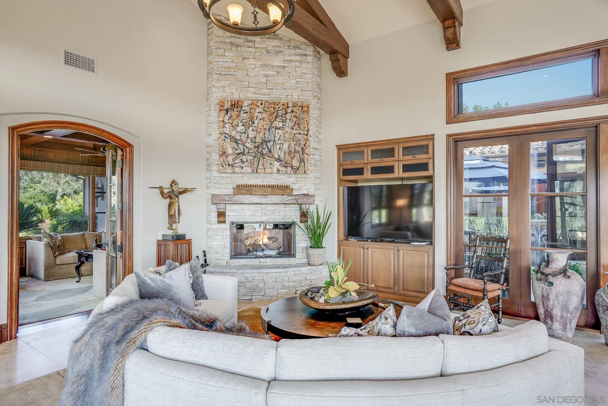 16581 Rd To Rio San Diego, CA 92127 - Photo 33 of 48 a living room with furniture and a fireplace