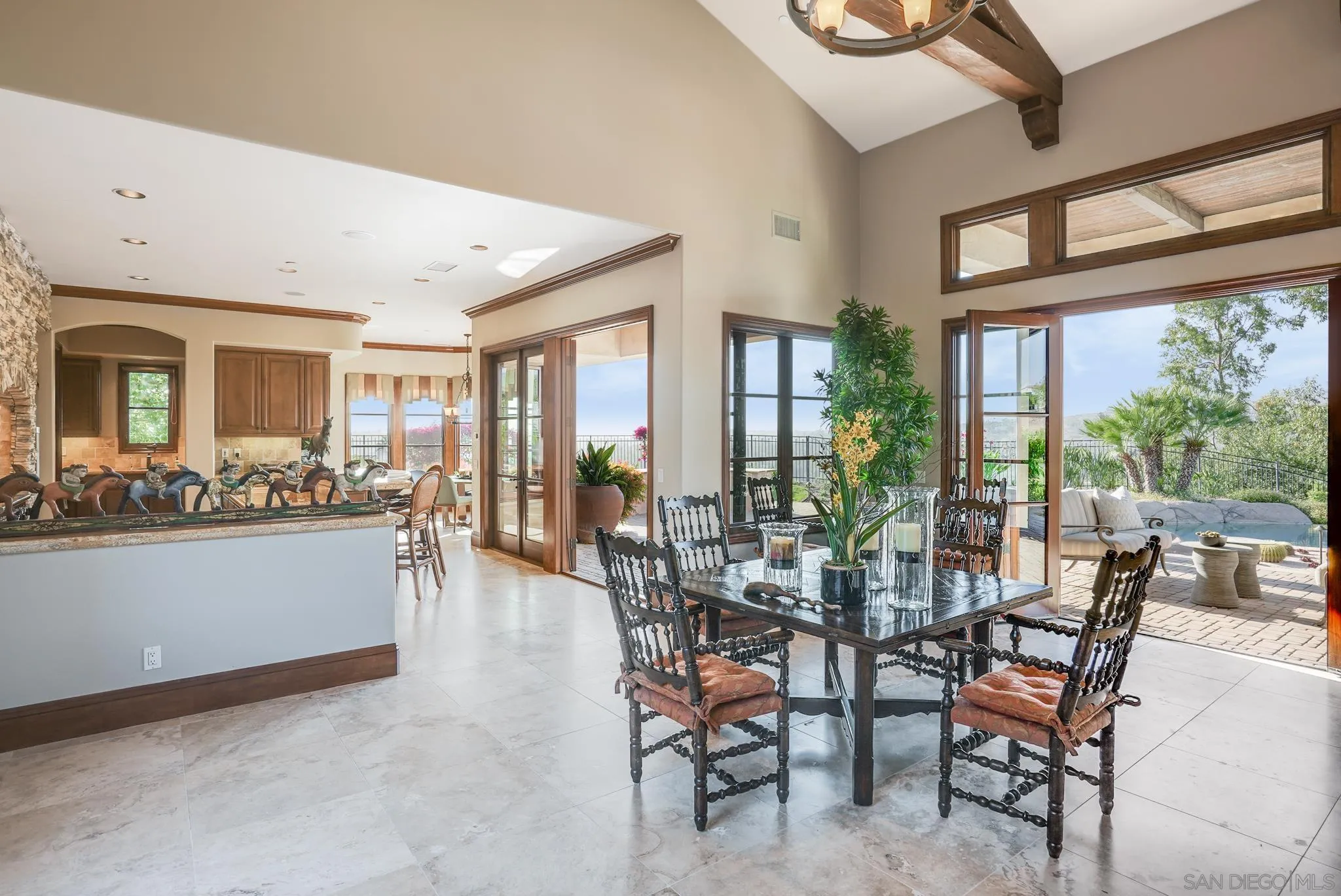 16581 Rd To Rio San Diego, CA 92127 - Photo 35 of 48 a dining room with furniture and a floor to ceiling window