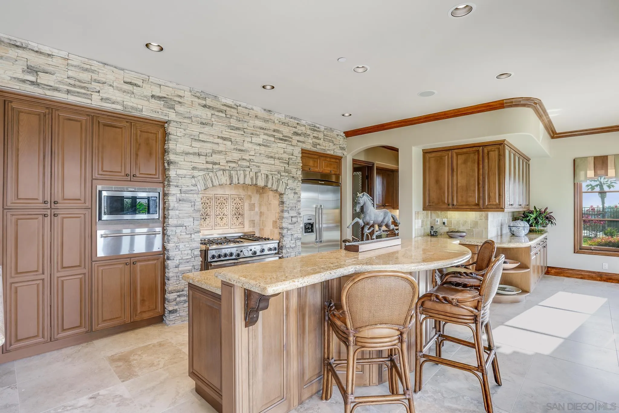 16581 Rd To Rio San Diego, CA 92127 - Photo 37 of 48 a dining hall with stainless steel appliances granite countertop a stove and a refrigerator