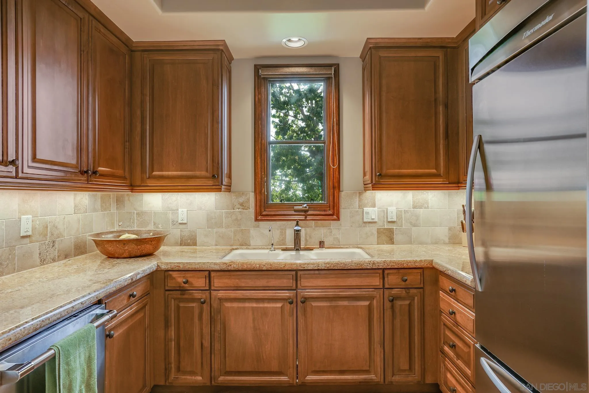 16581 Rd To Rio San Diego, CA 92127 - Photo 39 of 48 a kitchen with stainless steel appliances granite countertop a sink stove and refrigerator