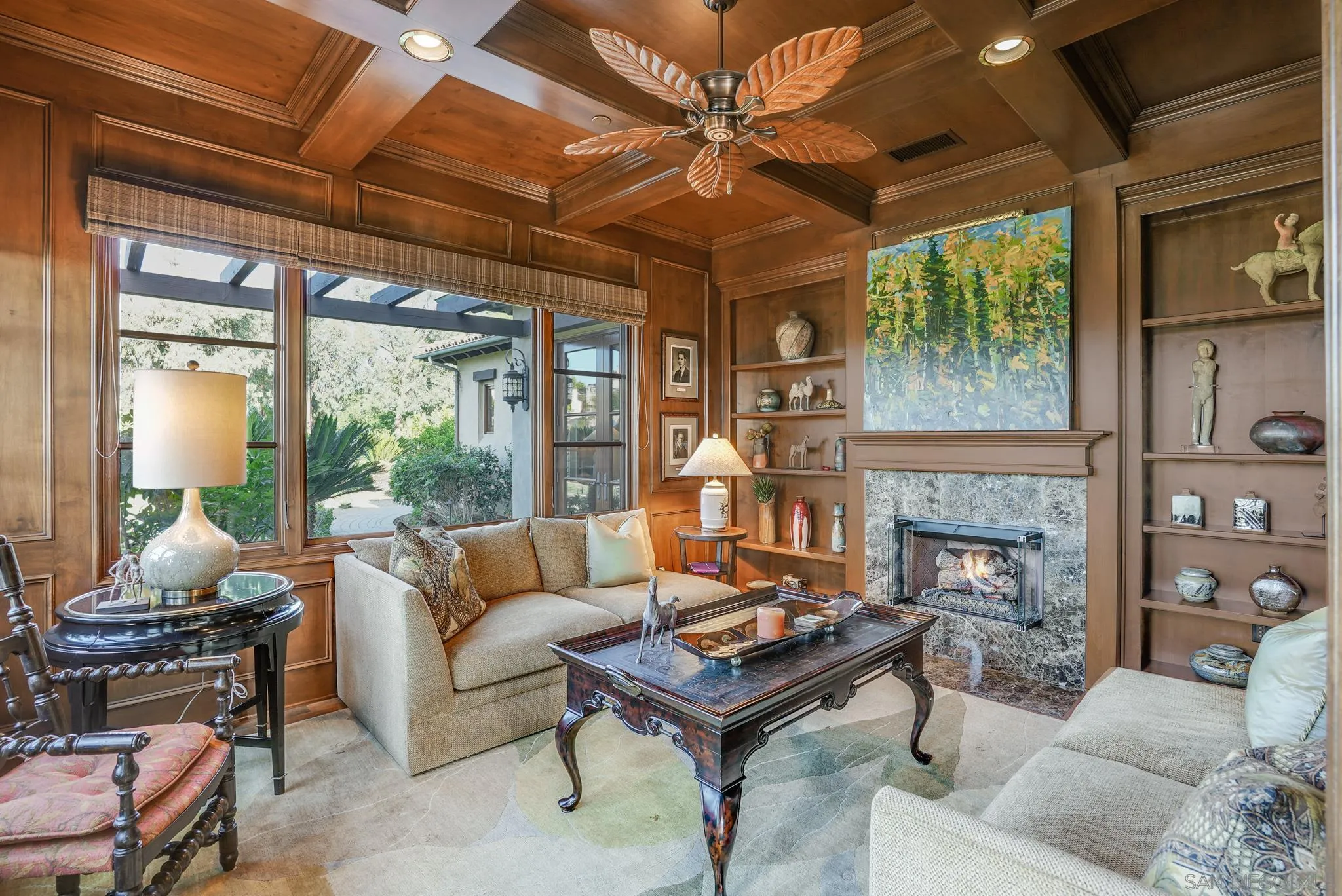 16581 Rd To Rio San Diego, CA 92127 - Photo 41 of 48 a living room with furniture a fireplace and a flat screen tv