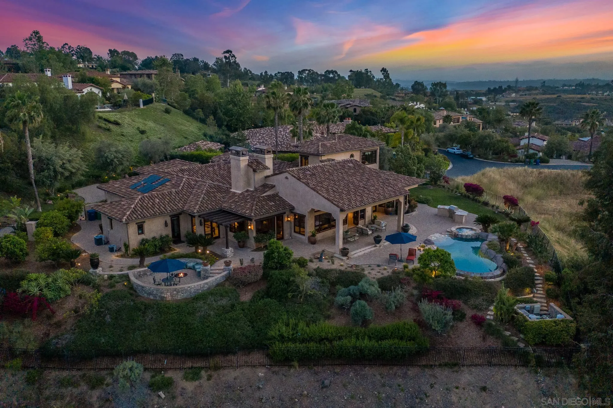 16581 Rd To Rio San Diego, CA 92127 - Photo 47 of 48 a view of a garden with a table under an umbrella