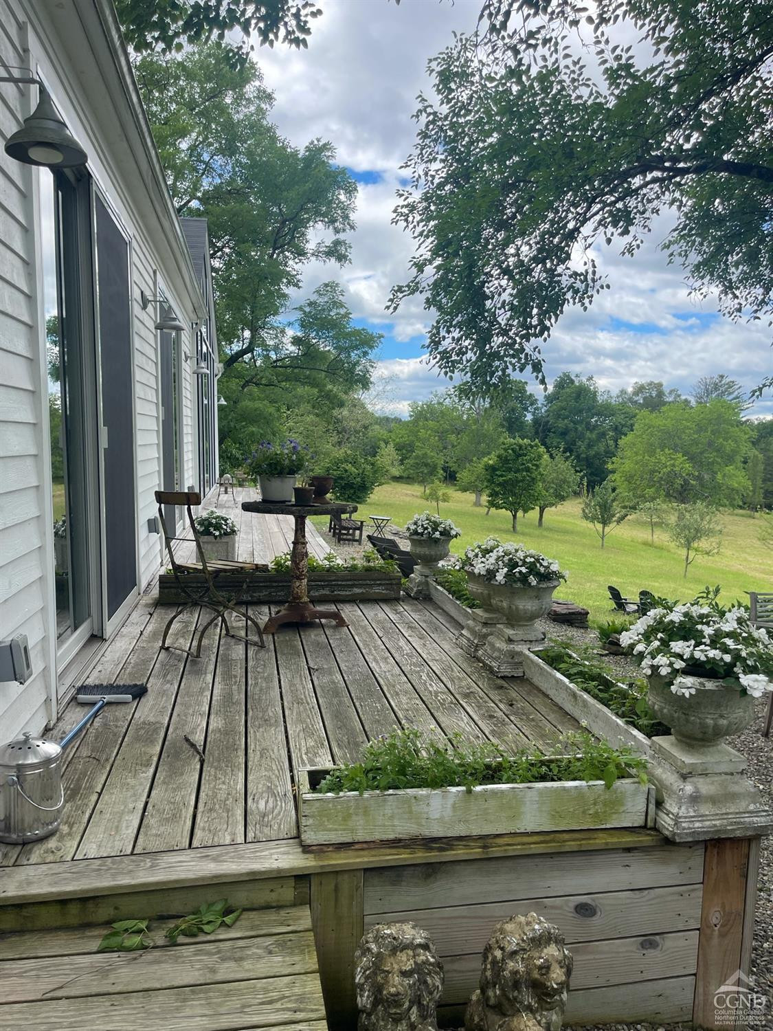 145 East Camp Road Germantown, NY 12526 - Photo 25 of 37 a view of a patio with chairs and a table