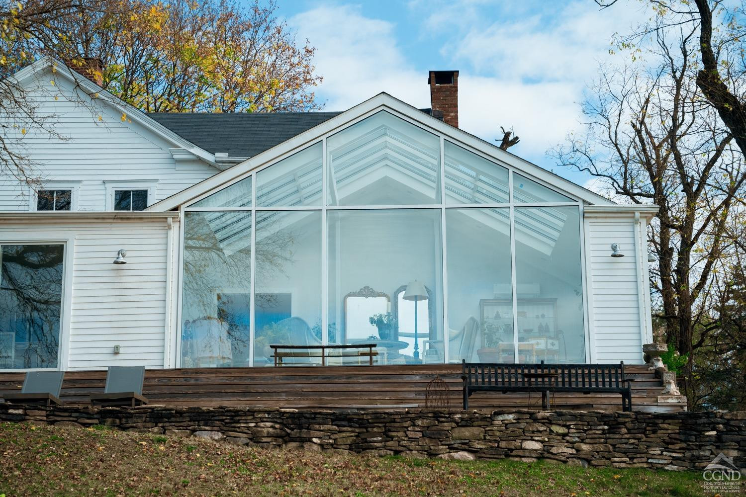 145 East Camp Road Germantown, NY 12526 - Photo 27 of 37 a small white house with a white roof and table and chairs
