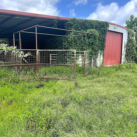 a view of backyard with green space