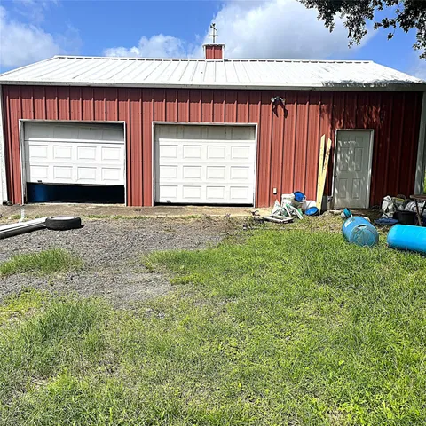 a view of outdoor space with front door