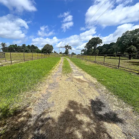 a view of a golf course with a lake