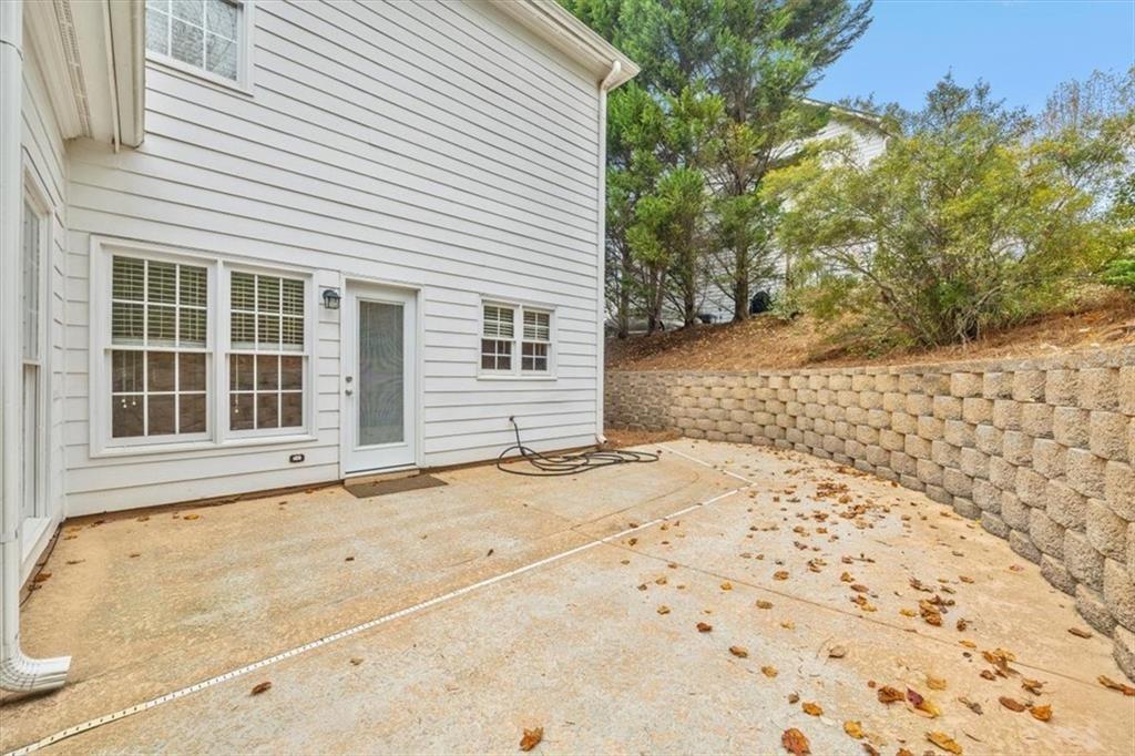 4115 Montvale Crossing Cumming, GA 30041 - Photo 34 of 40 a view of a backyard of a house